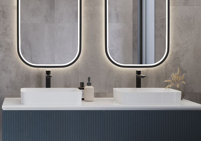 Modernt badrum med duschkabin och två handfat