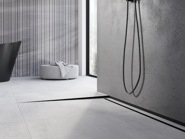 Plattor som imiterar betong i badrummet