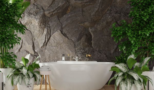 Fristående badkar i ett stilfullt badrum