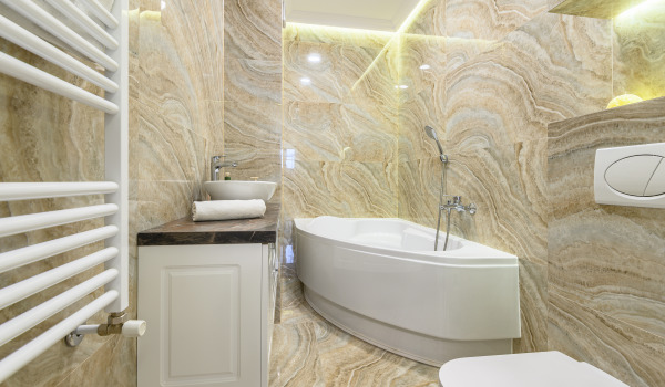 Vilken inramning ska man välja för ett hörnbadkar?